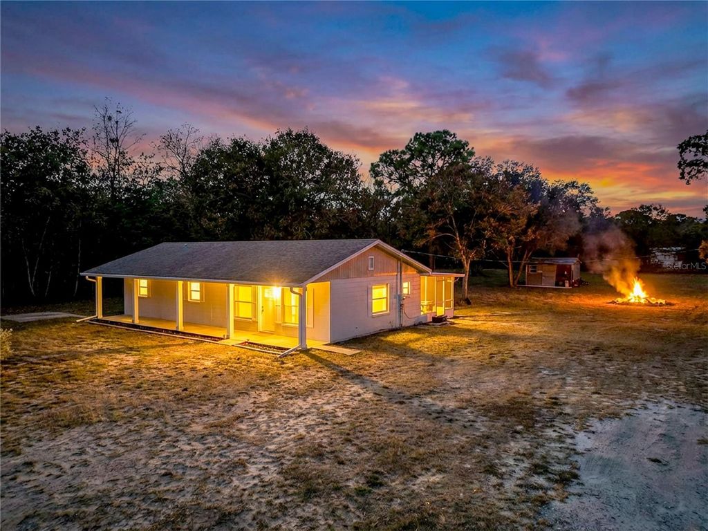 Photo of 9421 Sunshine Grove Road, Brooksville, FL 34613 (MLS # W7881140)