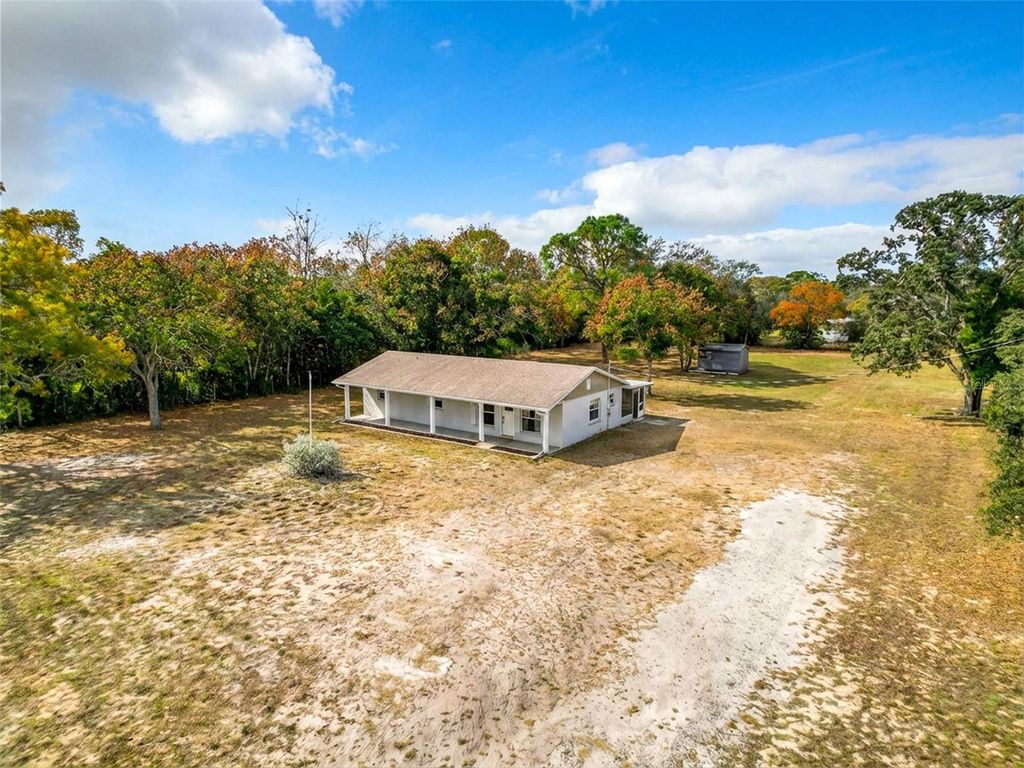 Photo of 9421 Sunshine Grove Road, Brooksville, FL 34613 (MLS # W7881140)