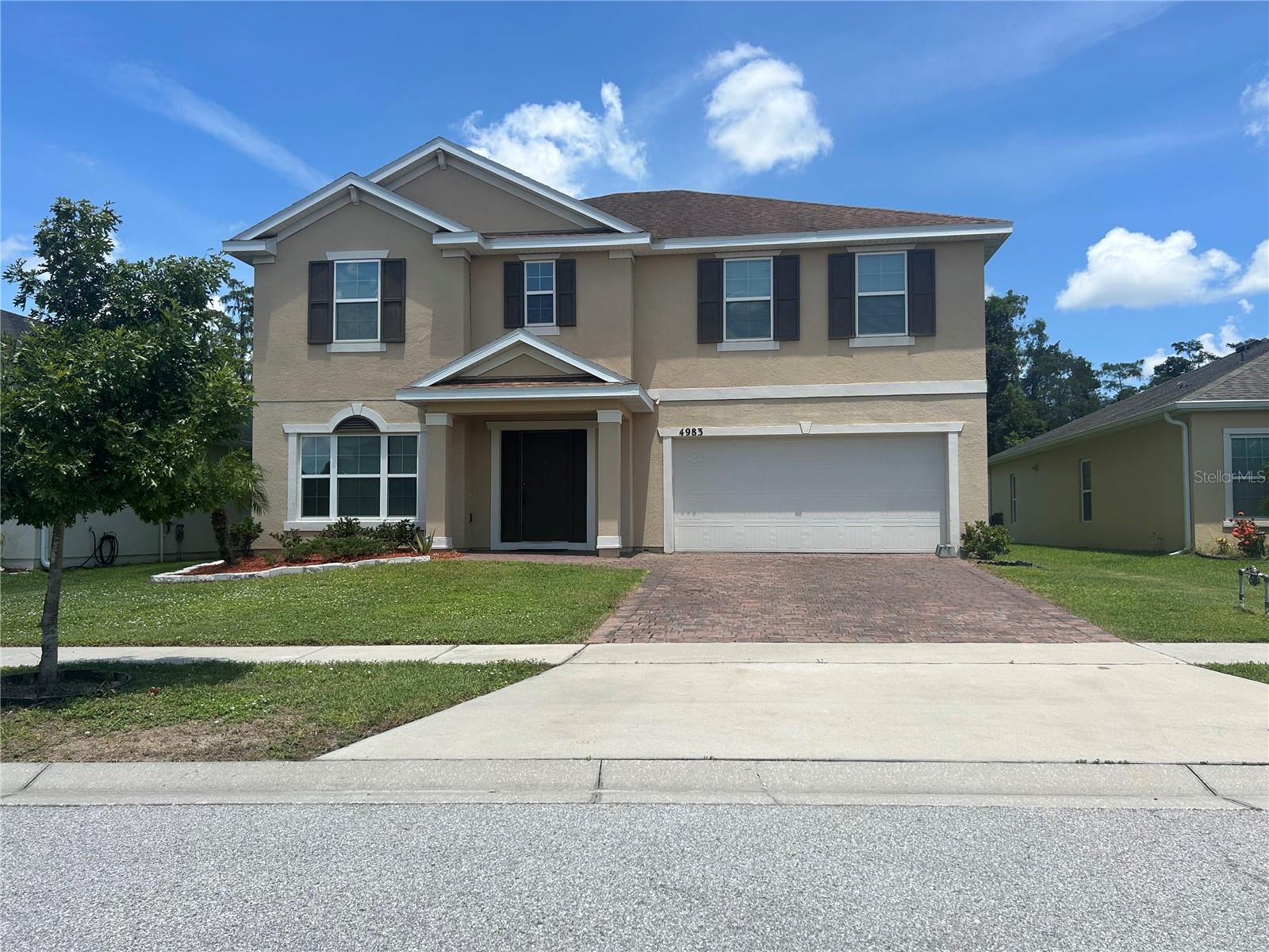 Step inside this beautifully maintained 5-bedroom, 3-bathroom home located in a welcoming Kissimmee neighborhood. The home features tile flooring throughout, offering a sleek look and easy maintenance. Each room is generously sized, with plenty of natural light and a layout that provides comfort and functionality for everyday living. The updated kitchen and bathrooms add a modern touch, while the open living and dining areas create an inviting space for entertaining. Outside, you’ll find a spacious backyard, perfect for gatherings, gardening, or simply relaxing in the Florida sunshine. This property has been cared for with pride and is move-in ready, making it an excellent choice for buyers looking for quality and value. Conveniently located near schools, shopping, dining, and major roadways, this home blends peaceful neighborhood living with easy access to all that Central Florida has to offer.