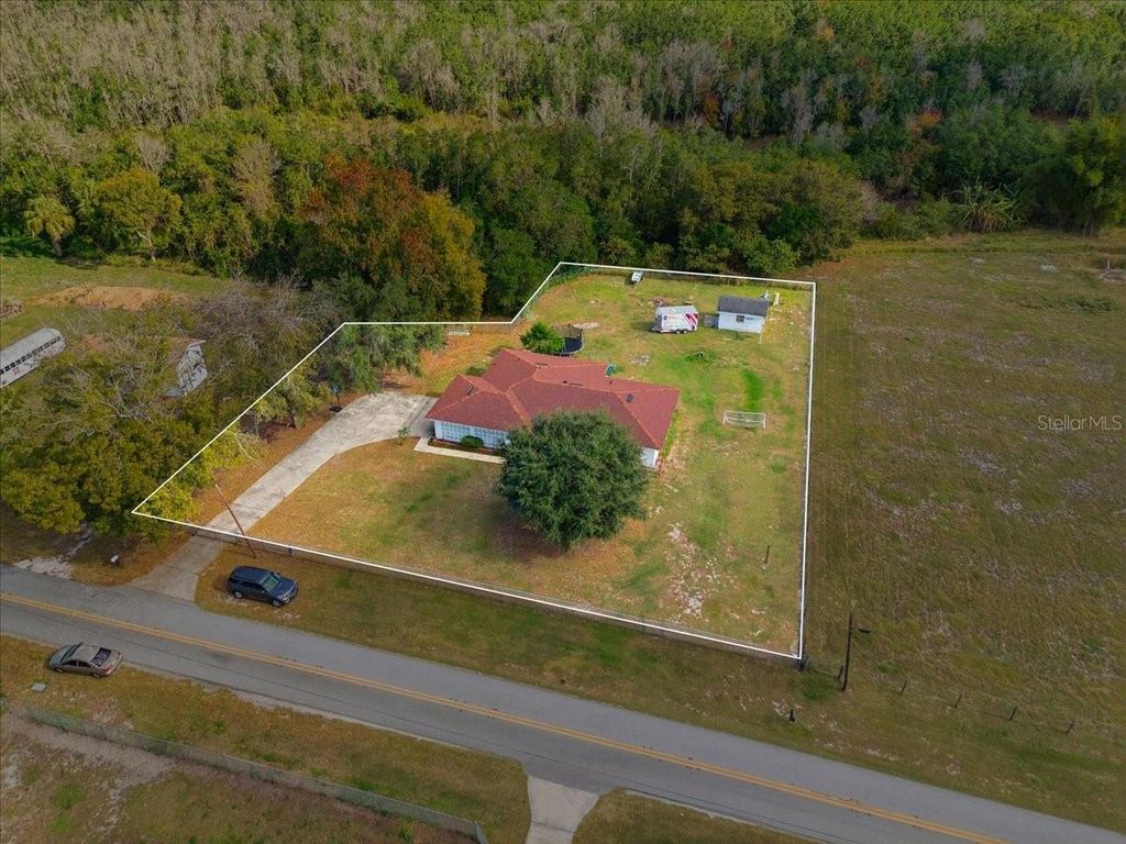 Photo of 518 W Lake Wales Road N, Lake Wales, FL 33859 (MLS # TB8460983)