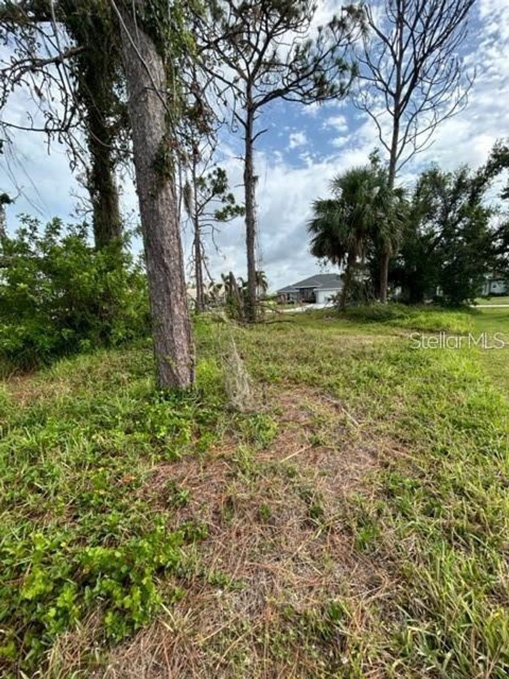 Photo of 23 Medalist Circle, Rotonda West, FL 33947 (MLS # A4657682)