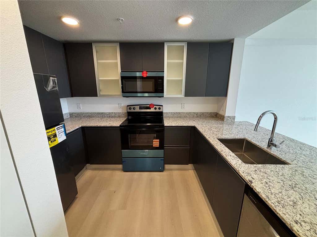 Photo of 5563 Millenia Park Boulevard #414, Orlando, FL 32839 (MLS # O6427486)