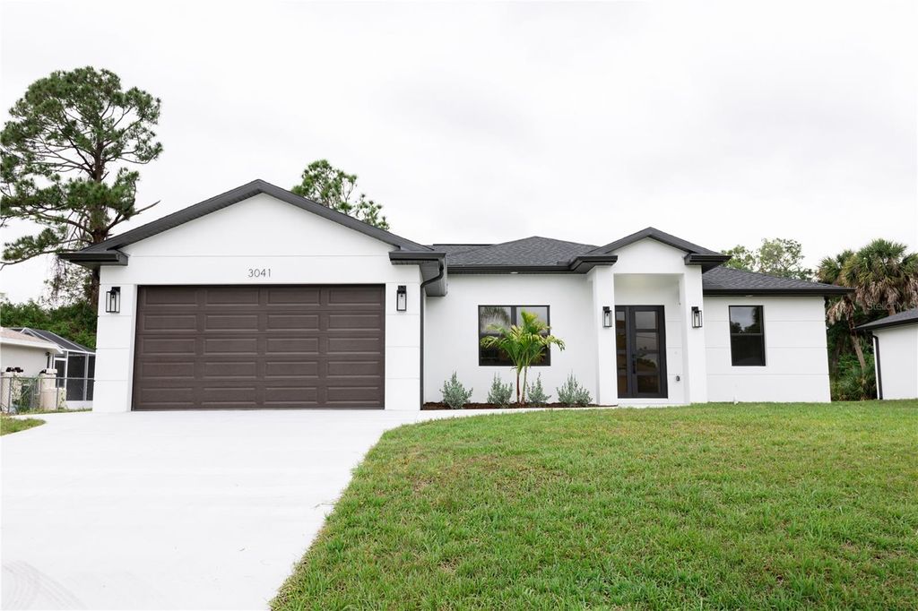 Photo of 3041 Draper Terrace, North Port, FL 34286 (MLS # C7525688)
