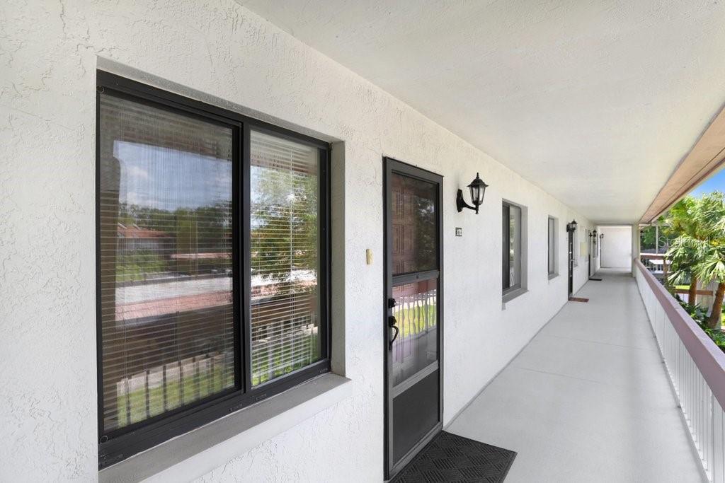 Are you ready to step into the Florida lifestyle? Then this turn-key ready, fully furnished, 2-bedroom, 2-bathroom condo with stunning water views is calling your name. It is perfectly situated in the highly desirable gated East Lake Woodlands Golf Course Community. This light and airy residence offers the ideal blend of comfort, convenience, and resort-style living with unobstructed water views and access to exceptional amenities. The kitchen and breakfast nook are filled with natural light, and from the moment you enter through the foyer, you're greeted by serene water views and an open, inviting layout. The home features a split-bedroom floor plan for added privacy, tile and luxury vinyl plank flooring throughout, a spacious dining room/living room combo with a wood-burning fireplace and sliding doors to the screened-in patio, a peaceful retreat overlooking the pond. There is a full-size in-unit washer and dryer and dedicated covered carport parking which adds to the ease of daily living. The generous primary suite is a true retreat, offering direct patio access, walk-in closets, and tranquil water views. The monthly condo fee covers water, sewer, trash, exterior maintenance, cable, internet, AND pest control, allowing for true low-maintenance living. Residents can also enjoy exclusive access to a private heated community pool and a car wash station. East Lake Woodlands is a secure, gated community known for its lush natural surroundings, picturesque lakes, ponds, and creeks, and is a renowned bird sanctuary. Optional membership to the newly renovated Ardea Country Club includes two 18-hole championship golf courses, 12 tennis courts and pickleball complex, two resort-style pools, a state-of-the-art fitness center, clubhouse, restaurants, and community social events.
Beyond the gates, enjoy a prime location just minutes from top-rated schools, Honeymoon Island, Clearwater Beach, and vibrant shopping and dining at Oldsmar Town Center. You're also within 20 minutes of both Tampa International and St. Petersburg/Clearwater Airports, making travel a breeze. This stunning water view condo truly offers the perfect blend of Florida lifestyle and location. Don’t miss your opportunity to own a piece of paradise in one of Tampa Bay’s most coveted communities!