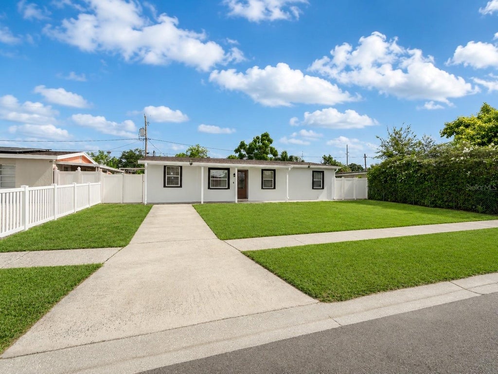 Photo of 4409 W Hanna Avenue, Tampa, FL 33614 (MLS # TB8535620)