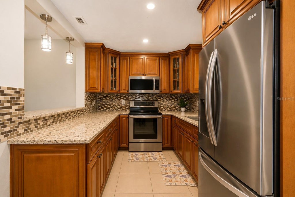 Photo of 4409 W Hanna Avenue, Tampa, FL 33614 (MLS # TB8535620)