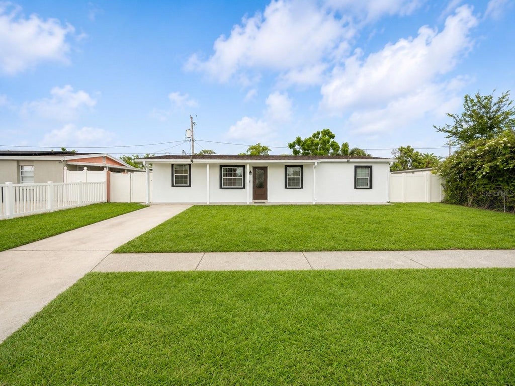 Photo of 4409 W Hanna Avenue, Tampa, FL 33614 (MLS # TB8535620)