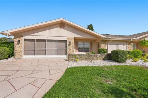 Photo of 127 Wintersong Lane, Sun City Center, FL 33573 (MLS # TB8533114)