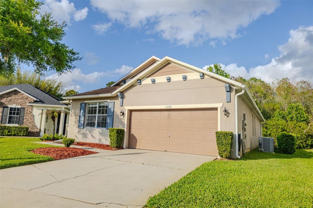 Photo of 11735 Malverns Loop, Orlando, FL 32832 (MLS # O6395054)