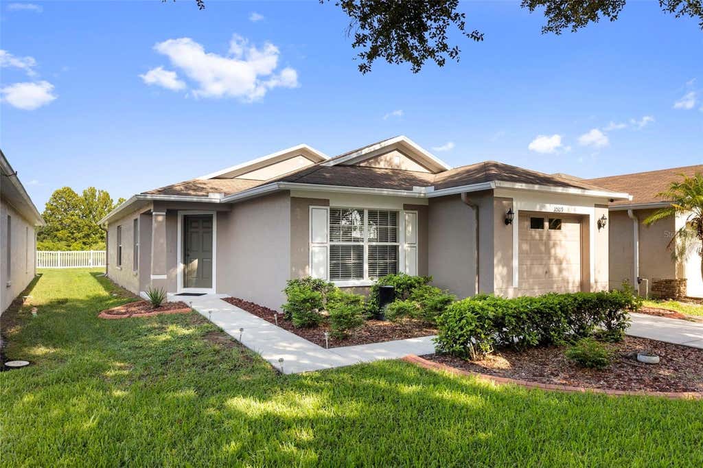 Photo of 10109 Landport Way, Land O Lakes, FL 34638 (MLS # TB8529114)