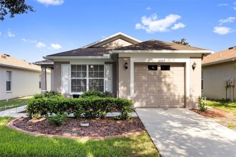 Photo of 10109 Landport Way, Land O Lakes, FL 34638 (MLS # TB8529114)