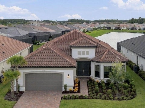 Photo of 29596 Toricelli Road, Wesley Chapel, FL 33543 (MLS # TB8546053)