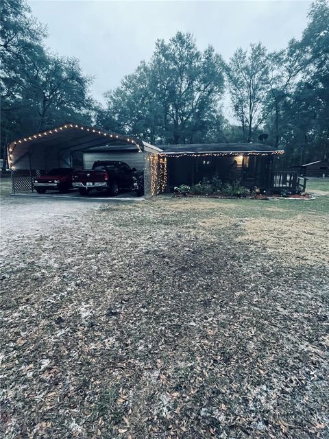 Photo of 10720 SW 151st Place, Dunnellon, FL 34432 (MLS # OM715960)