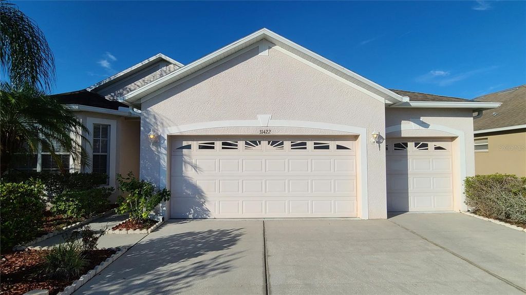 Photo of 31422 Bridgegate Drive, Wesley Chapel, FL 33545 (MLS # TB8505592)