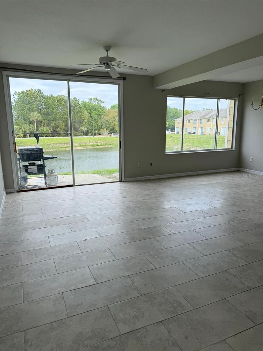 Photo of 631 Washington Palm Loop, Davenport, FL 33897 (MLS # O6393949)