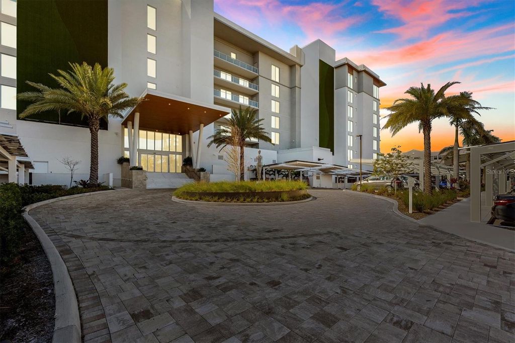 Photo of 1020 Sunset Point Road #108, Clearwater, FL 33755 (MLS # TB8432974)