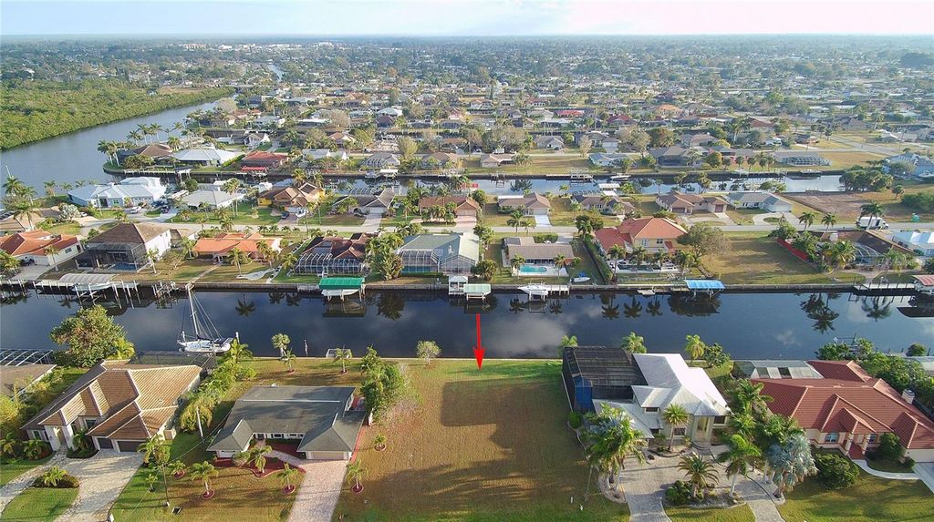 Photo of 122 Graham Street SW, Port Charlotte, FL 33952 (MLS # C7504848)