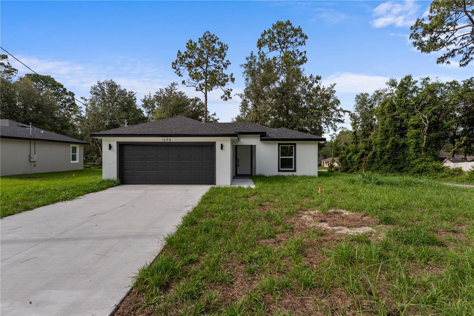 Discover the perfect blend of modern design and functionality in this beautifully built new home, ideally located in the growing community of Orange City. From the moment you step inside, you’ll be captivated by the open-concept layout, clean architectural lines, and abundance of natural light throughout the living spaces.
The gourmet kitchen is a true centerpiece—designed for both everyday living and entertaining. It features a large center island with bar seating, custom cabinetry, and quality finishes that reflect timeless style. The seamlessly connected living and dining areas gives generous space for relaxing or hosting, all wrapped in a warm, inviting atmosphere.
s
Step outside and enjoy Florida living at its finest with a spacious backyard
Located just minutes from natural springs, scenic parks, and a short drive to the beaches and Downtown Orlando, this is more than a home—it’s a lifestyle opportunity.
Don’t miss your chance to own a brand-new home in one of Central Florida’s most promising areas. Schedule your private showing today!