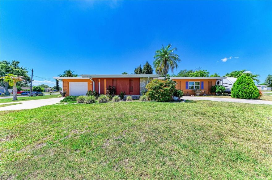 Step into serene living with modern updates and timeless charm at 2486 Conway Blvd in Port Charlotte! This beautifully refreshed home sits on an oversized corner lot with 3-bedrooms, 2-bathrooms offering 1,637 square feet of inviting space designed for comfort and style.

Major updates provide both peace of mind and lasting value: a 2018 roof, a brand-new AC system (handler and condenser) installed in 2025, and a water heater also added in 2025. In 2023, the home was further enhanced with all impact windows, doors and impact garage door.

Inside, the home feels bright and welcoming. The primary bedroom features durable luxury vinyl plank flooring, while the two additional bedrooms showcase classic tile and terrazzo. The living and dining areas are painted in soothing tones that create a fresh, cohesive atmosphere. Throughout the home, wooden vanities add a touch of warmth and character.

The kitchen is both functional and inviting, featuring terracotta floors, a granite countertop with a 6-burner cooktop, and original cabinets that have been lovingly maintained. A breakfast bar offers casual dining, while a cozy nook and formal dining area provide options for every occasion.

Outdoors, a tranquil garden awaits with lush greenery, a peaceful walking trail, and three striking Buddha Belly Bamboos that serve as a captivating centerpiece. Whether you’re sipping your morning coffee or simply unwinding, the patio offers the perfect space to enjoy nature and relaxation.

Just minutes from Charlotte Harbor, you’ll have access to some of Florida’s most scenic waters. Port Charlotte Golf Club is right nearby (0.4 miles), offering a premier golfing experience. At Gilchrist Park (4 miles), enjoy easy access to waterfront walking trails, fishing piers, pickleball courts, boating, and some of Southwest Florida’s most beautiful sunset views. Located near Alligator Creek Preserve (8 miles), enjoy convenient access to scenic nature trails, wildlife viewing, and birdwatching. Interstate I-75 is approximately 10 minutes away for easy travel and Fawcett Hospital is just about 10 minutes away.

This home is more than just a property—it’s a lifestyle. Don’t miss your chance to make it yours!