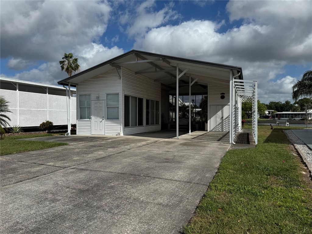 Photo of 35207 Condominium Boulevard #Lot 52, Zephyrhills, FL 33541 (MLS # TB8369864)