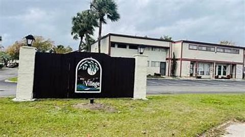 Photo of 3928 Crayrich Circle #A12, Orlando, FL 32839 (MLS # O6261438)