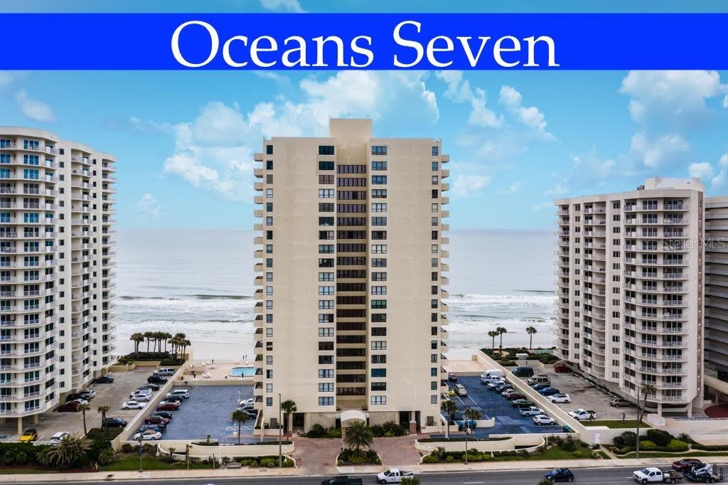 A once in a lifetime opportunity!
THIS FAMILY COMPOUND HAS BEEN A SUMMER HOME FOR 41 YEARS. OFFERED FOR THE VERY FIRST TIME IN OVER 4 DECADES. ARCHITECTURALLY ONE OF THE RAREST OFFERING TO DATE.
PENTHOUSE “F” AT THE ICONIC OCEANS SEVEN IS AN EXCLUSIVE SANCTUARY OFFERING A CORNER UNIT, AN EPIC CONDO IN THE SKY, TOWERING 21 MAJESTIC STORIES ON TWO-LEVELS WITH MESMERIZING OCEAN AND RIVER VIEWS! SPRAWLING 1,893 SQUARE FEET WITH 3 BEDROOMS 3 BATH, MULTIPLE VERANDAS, AND VIEWS OF THE WORLD’S MOST FAMOUS BEACH. WITH ONLY 6 TWO-STORY PENTHOUSE UNITS IN AN OCEANS BUILDING, THIS IS A RARE ENTITY.
A DRAMATIC 16 FOOT ATRIUM IN THE LIVING ROOM & DINING ROOM SHOWCASED BY CLERESTORY WINDOW’S CAPTURES THE CROWNING JEWEL OF THIS JEM: 180 DEGREE OCEAN AND INTRACOASTAL VIEWS THAT TRANSCEND INTO THE HORIZON SEAMLESSLY.
THE neutral color palette highlights the BACKDROP of the EMERALD BLUE OCEAN WITH THIS ONE-OF-A-KIND MASTERPIECE OF UNPARALLELED BEAUTY!
NOTEWORTHY UPGRADES INCLUDE HURRICANE RATED IMPACT WINDOWS AND SLIDERS (2019, $50,000). 12x12 TILE ON FIRST FLOOR, NEW WATER HEATER (2022), NEW CAST IRON DRAIN, HALLWAY (2019). FIRST FLOOR JR. PRIMARY WITH ENSUITE OFFERS TANTALIZING RIVER VIEWS FROM THE TRIPLE WINDOW. HEAD UPSTAIRS, AND WROUGHT IRON BALUSTERS ON THE STAIRCASE SOAR IN MID-AIR INVITING YOU TO THE LOFT SPACE. OVERLOOKING THE CATHEDRAL LIVING AREA, THE LOFT OFFERS A SENSATIONAL VANTAGE POINT AND WOULD MAKE A PERFECT SITTING AREA OR OFFICE. TWO ADDITIONAL BEDROOMS UPSTAIRS WITH ENSUITE AND PRIVATE BALCONY OFF THE PRIMARY.
2 UNDERGROUND PARKING SPACES, ONE ONLY STEPS FROM THE ENTRY, PLUS OVERSIZED STORAGE FOR ALL YOUR BEACH NEEDS. THE BUILDING HAS MANY WONDERFUL UPDATES INCLUDING: NEW ELEVATORS, NEW TILE AND DESIGNER WALLPAPER ON EVERY LANDING, NEW FOB SYSTEM, FITNESS CENTER BEING REFURBISHED, RESURFACED POOL DECK, NO PENDING ASSESSMENTS.
OCEANS SEVEN OFFERS SOME OF THE BEST AMENITIES: HEATED OUTDOOR POOL WITH EXPANSIVE POOL DECK, BBQ STATION, SAUNAS, TWO SOCIAL ROOMS, GAME ROOM, DIRECT BEACH ACCESS. No pet building. 30 day first right of refusal. This home is in a sought-after location close to Publix, restaurants, shopping, minutes to Ponce Inlet Historic Lighthouse, just over an hour to Disney/Orlando and three-and-a-half hours to Miami. All information intended to be accurate but should be verified.