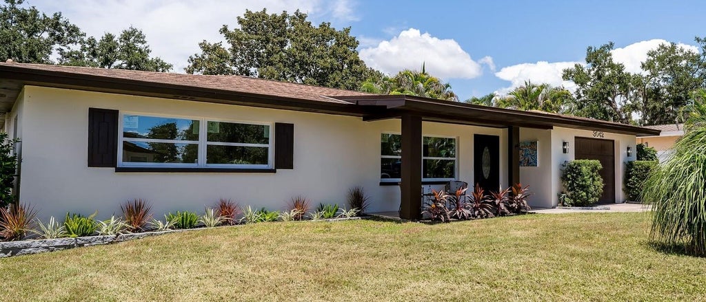 Photo of 3042 Kapok Kove Drive, Clearwater, FL 33759 (MLS # TB8536442)