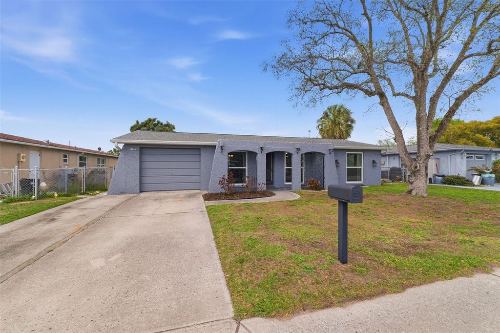 Photo of 10011 Cherry Creek Lane, Port Richey, FL 34668 (MLS # W7883993)