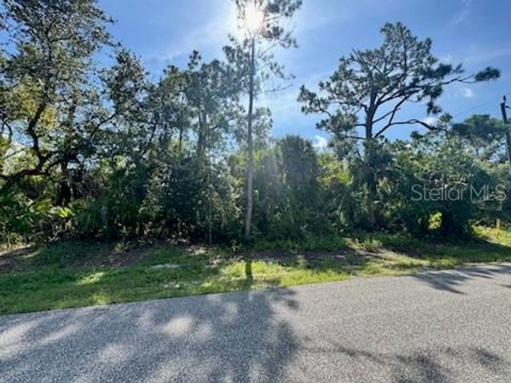 Photo of 104 Troutdale Street, Port Charlotte, FL 33954 (MLS # C7514181)