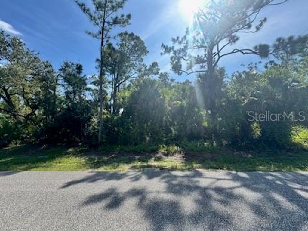Photo of 104 Troutdale Street, Port Charlotte, FL 33954 (MLS # C7514181)