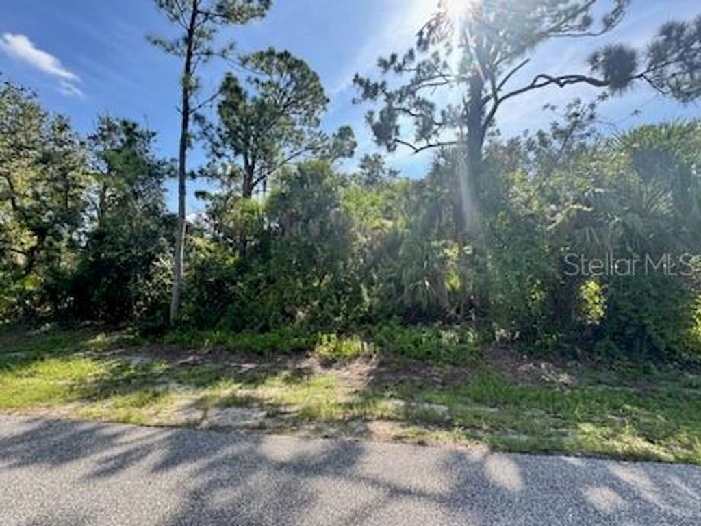 Photo of 104 Troutdale Street, Port Charlotte, FL 33954 (MLS # C7514181)