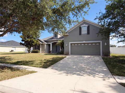 Photo of 457 Amethyst Avenue, Auburndale, FL 33823 (MLS # O6410769)