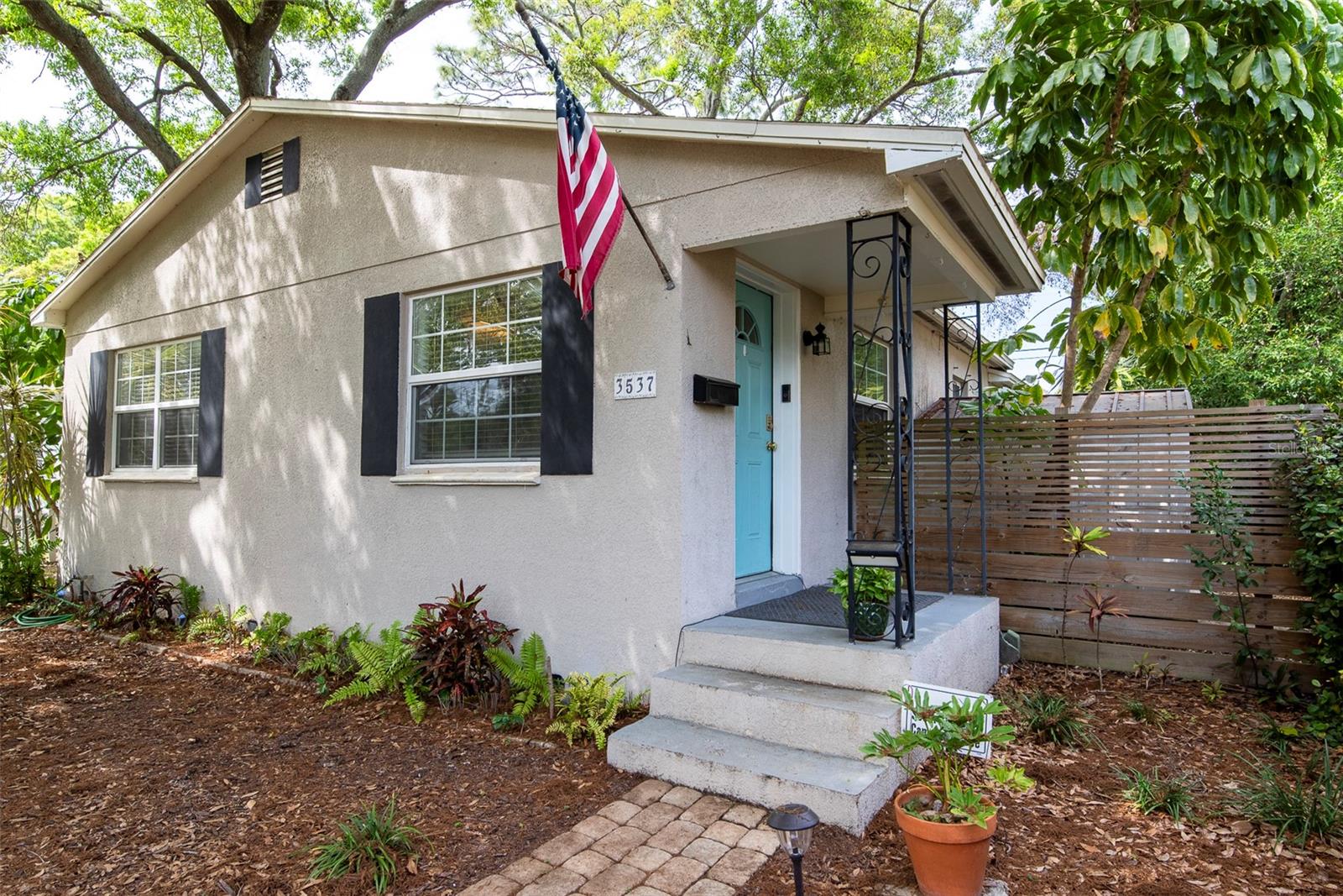 Beautifully updated and well-maintained 3-bedroom, 2-bathroom home in one of St Pete's most beloved neighborhoods (Central Oak Park). This home offers a Lovely living room and a comfortable family room. Updated kitchen with wood cabinets and stone countertop. Great lighting, stainless steel appliances, and gas stove. Two front bedrooms come with sliding mirror closet doors and a ceiling fan. The hall bathroom comes with a tub. The master suite is at the other end of the house. Has a laundry closet with a stackable washer and dryer. The master bath has a walk-in shower with a rain shower head. Exit the family room through the French doors to the side deck. Enjoy a cookout or relax in your heated spa. The back fence has an electric gate for your convenience. Lovely oak trees provide wonderful shade for your home. Furniture is negotiable. You’re just minutes from downtown, I-275, and the award-winning Gulf Beaches, museums, Tropicana Field as well as close stops on the new SunRunner public transportation system. Under 5 minutes to the Grand Central District nightlife, and all the entertainment you'll ever need! The seller is willing to negotiate to replace the roof.