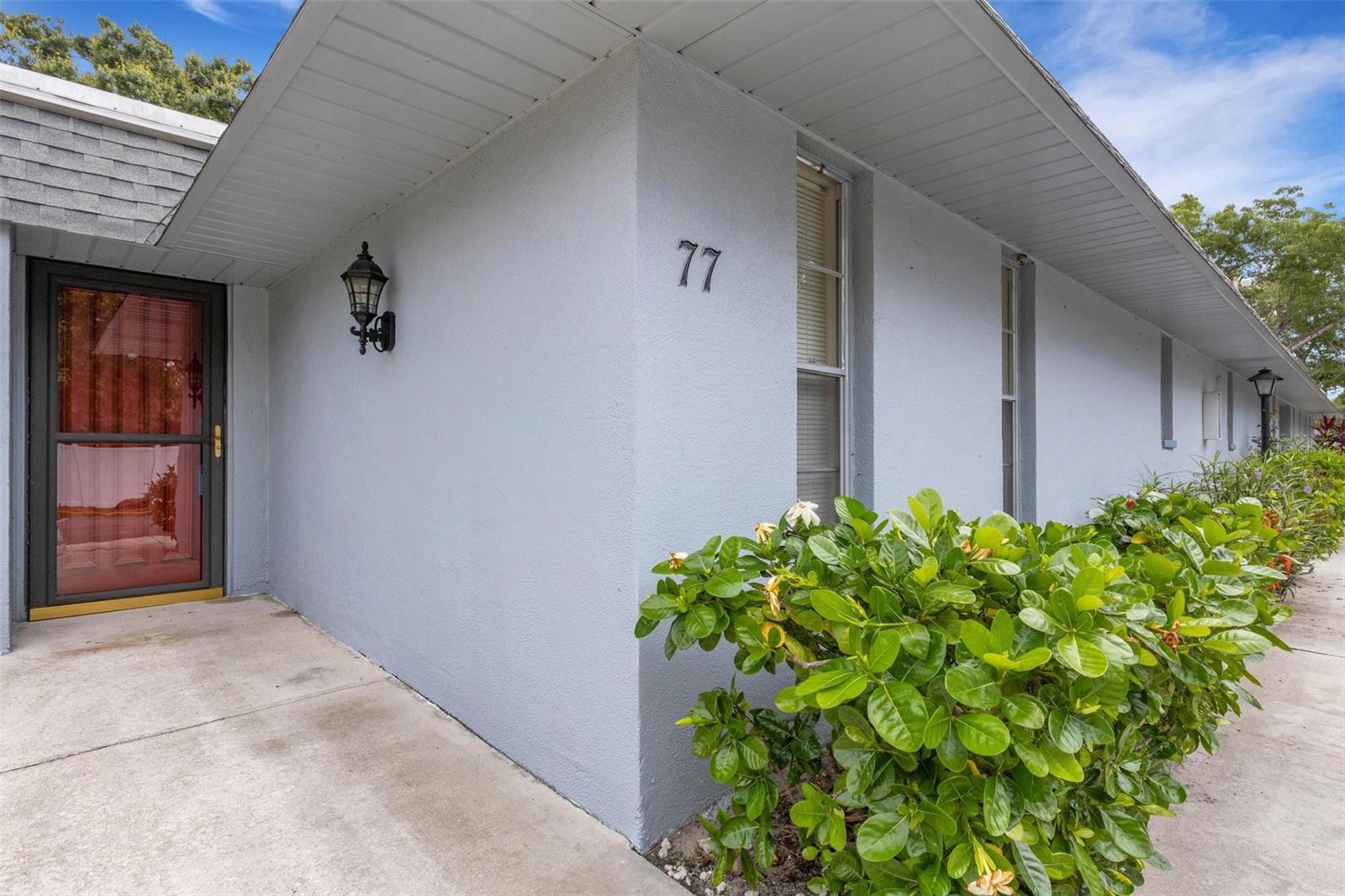 Welcome to maintenance-free, one level living in Sarasota! This delightful 2-bedroom, 2-bath villa is just a short drive to award-winning beaches, Sarasota Bradenton International Airport, St. Armand's Circle, The Mall at University Town Center, museums, restaurants & theatre! Spacious kitchen and updated baths. Enjoy relaxing mornings on your screened rear lanai and stop and smell the gardenias. This community offers a wide range of amenities- including a pool, clubhouse with a fitness area and a sauna, kitchen, library, pool table, foosball, and more! The Clubhouse was just updated 1 year ago, with a full calendar of monthly activities and options. Great value in sought after location, right off of Fruitville Rd! This villa is in the rear of the property providing more privacy. Assigned covered parking adds everyday convenience. This is Florida living at its best—low-maintenance, low fees and great location.