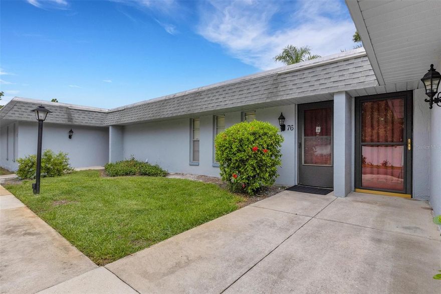 NEW PRICE-Welcome to maintenance-free, one level living in Sarasota! This delightful 2-bedroom, 2-bath condo is just a short drive to award-winning beaches, Sarasota Bradenton International Airport, St. Armand's Circle, The Mall at University Town Center, museums, restaurants & theatre! Spacious kitchen and updated baths.  Enjoy relaxing mornings on your screened rear lanai and stop and smell the gardenias.  Washer and dryer in unit, and all appliances convey. This community offers a wide range of amenities-  including a pool, clubhouse with a fitness area and a sauna, kitchen, library, pool table, foosball, and more!  The Clubhouse was just updated 1 year ago, with a kitchen and full calendar of monthly activities and options. Great value in sought after location, right off of Fruitville Rd! This villa is in the rear of the property providing more privacy. Assigned covered parking adds everyday convenience. This is Florida living at its best—low-maintenance, low fees and great location. Move in ready!