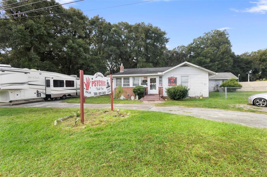 Photo of 2480 N Woodland Boulevard, Deland, FL 32720 (MLS # V4938839)