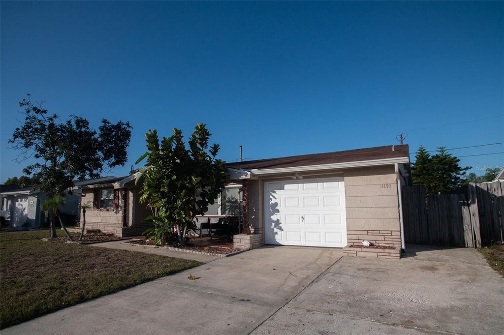 Photo of 1153 Tamarac Drive, Holiday, FL 34690 (MLS # W7881426)