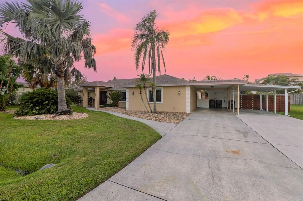 Photo of 6454 Beechwood Avenue, Sarasota, FL 34231 (MLS # A4663295)