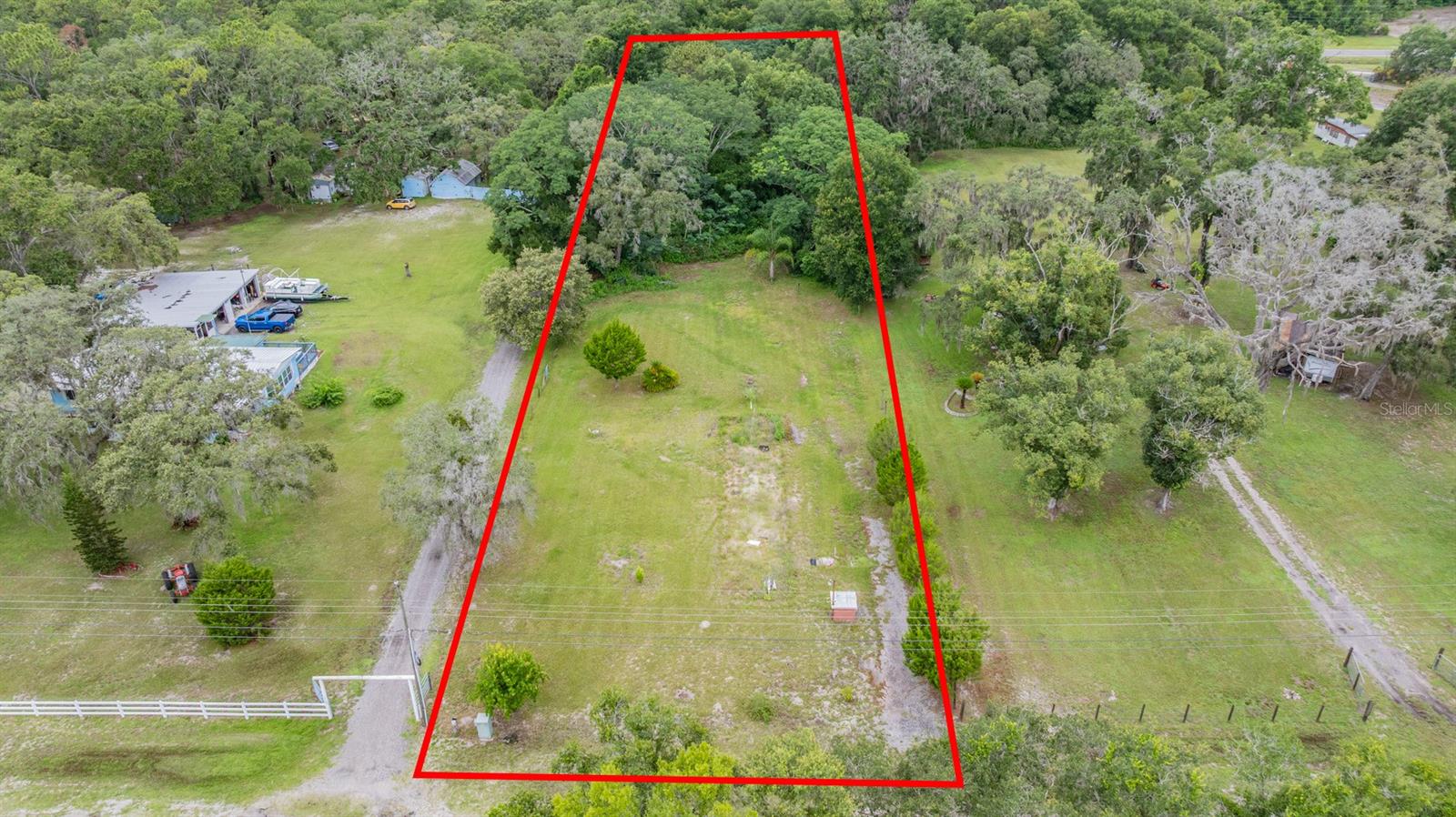 Dreaming of wide-open space, maybe raise your own chickens or own your own horse! Here's your opportunity! Build your dream home or place a mobile home on this spacious 1.07-acre parcel. Zoned Agricultural/Residential/Mobile Home. The land is already cleared and comes equipped with a septic system and well. Located in a peaceful rural setting, this property offers plenty of space for animals while still being conveniently close to shopping and dining, with quick access to the Suncoast Parkway.
