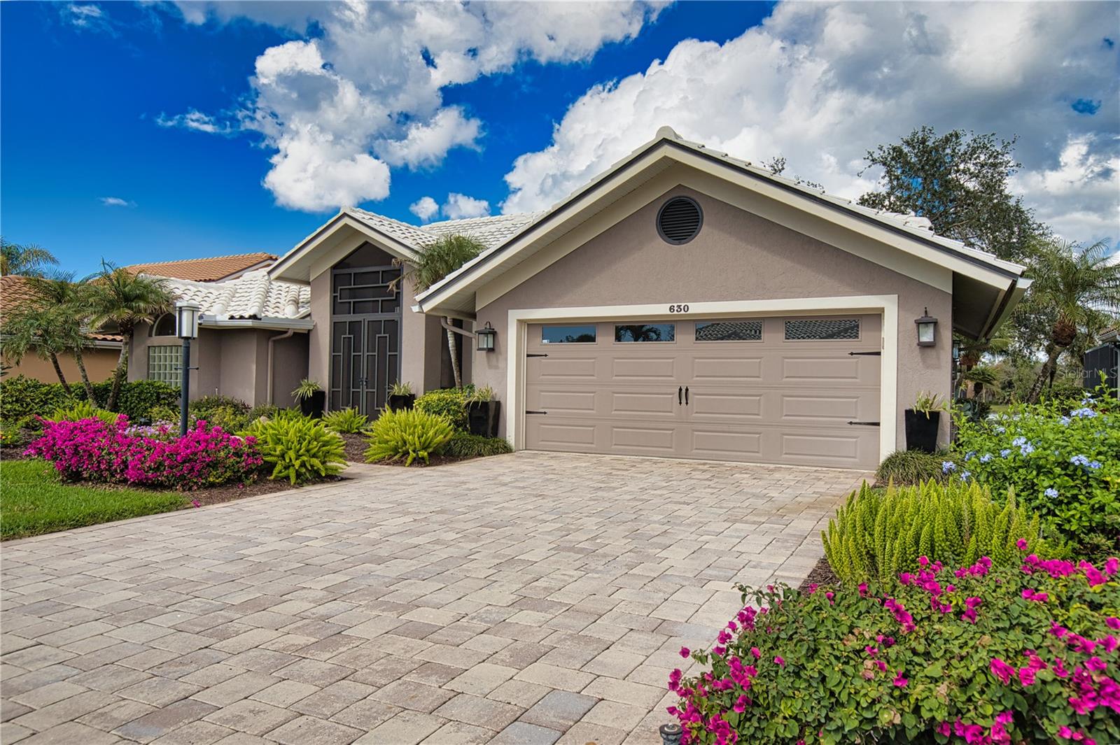 2025 AVAILABLE: JUN, JUL, AUG, SEP, OCT, NOV, DEC.
2026 AVAILABLE: JAN.
BOOK AT: $9000/PER MONTH (SEASON IS DEC-APRIL, 3 MONTH MINIMUM)
BOOK AT: $5000/PER MONTH (OFF SEASON IS MAY-NOV, 3 MONTH MINIMUM)
*PRICES MAY VARY DEPENDING ON NUMBER OF NIGHTS BOOKED*
Experience breathtaking panoramic views of the signature 15th hole island green of The Plantation Golf & Country Club from this stunning 3-bedroom, 3-bathroom custom home in the exclusive gated Governors Green neighborhood. Designed to bring the outdoors in, this home features walls of windows and tall ceilings that flood the interior with natural light and showcase unmatched golf course and lake views.
Step through grand double doors into a spacious open living area, which boasts impressive 12-foot ceilings, enhancing the home's airy and elegant feel. Sliding glass doors seamlessly connect to the expansive outdoor lanai, with a heated saltwater pool & spa, complete with elegant fire features and an incredible view, creates the ultimate private oasis. The outdoor kitchen & bar, along with a dining area, make entertaining effortless and capture the essence of Florida living.
With over 2,300 sq ft of designer-inspired living space, this home offers a split floor plan that balances privacy and togetherness. The comfortable living room & dining room provide elegant entertaining options, while the breakfast nook & bar open to a cozy family room with a gas fireplace, perfect for relaxed evenings. The gourmet kitchen comes complete with a large granite island, custom soft close cabinetry, gas cooktop, electric oven and stainless steel appliances.
The primary suite is a private retreat, featuring sliding glass doors to the lanai, dual walk-in closets, spa like bath with glass enclosed walk-in shower, soaking tub and dual sinks. The second bedroom and third bedroom/den are nicely situated on the opposite side of the house. The second bathroom is outfitted with a combination tub and shower. The third bedroom/den features an ensuite bath with shower that also doubles as a pool access bathroom for added convenience.
In addition to being just minutes from Downtown Wellen Park, the Braves Stadium, beautiful beaches, Downtown Venice, shopping, dining, and medical facilities, this home includes a Social Membership to the prestigious Plantation Golf & Country Club which includes:
~Clubhouse dining & social events
~Community pool
~Tennis, bocce ball & pickleball courts
~24-hour fitness center & classes
Rental Details:
~Rent includes: Water/Sewer, Cable TV or Streaming Service, Wi-Fi, Landscaping, and Pool Service.
~Electric cap: $150/month
~Social Membership
~Third bedroom/den – pullout couch
~Small dog considered