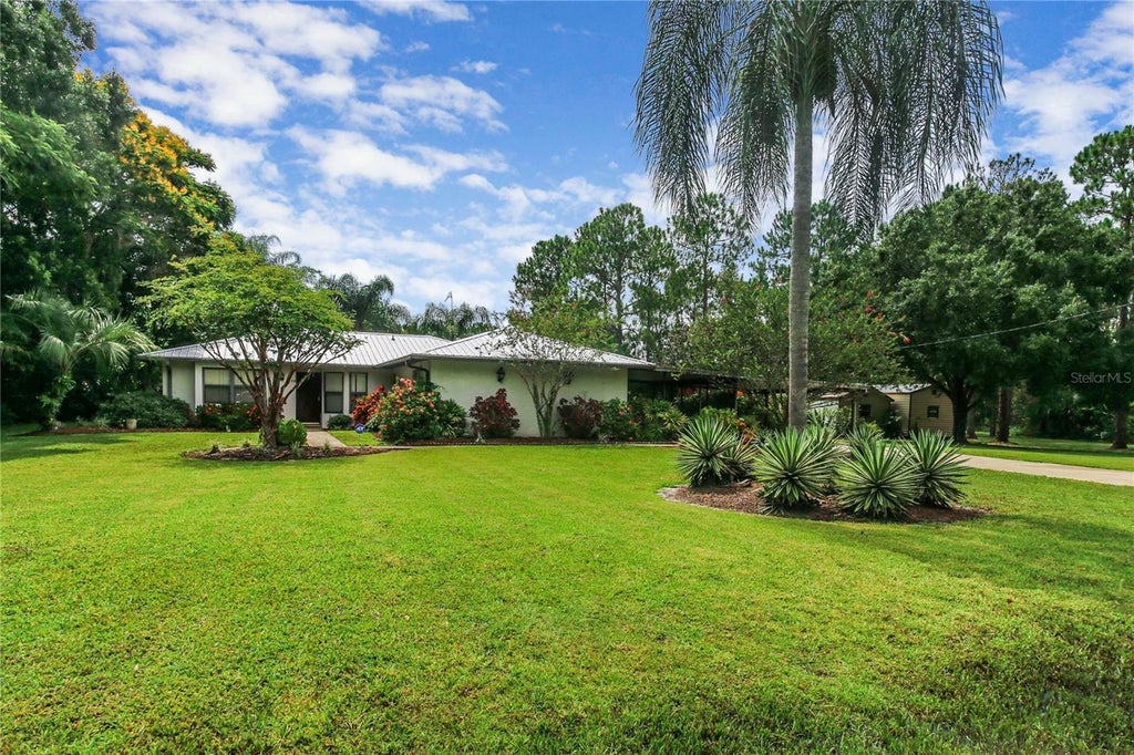 Photo of 6168 Arborea Drive, Indian Lake Estates, FL 33855 (MLS # L4963476)