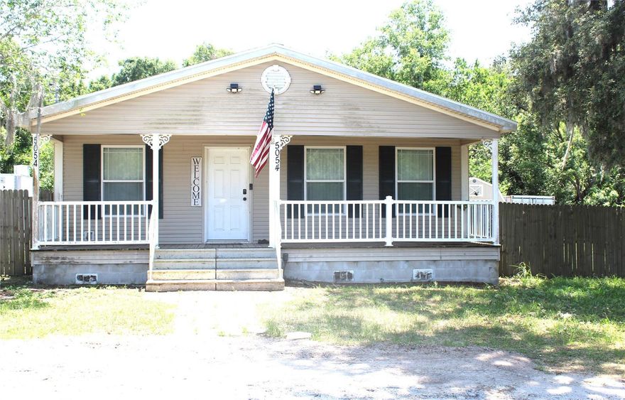 Back on the market with a new price and a fresh opportunity to make it yours! This spacious 3-bedroom, 2-bath home offers 1,680 square feet of comfortable living on a fully fenced 0.41-acre oversized lot with no HOA. Enjoy the freedom and flexibility to use your property your way.The expansive lot features a privacy fence with gated access and provides abundant space for RV, boat, work truck, or recreational vehicle parking, with room to add a large garage or workshop if desired. Inside, the home offers a functional open floor plan, a spacious kitchen, newer flooring, and a convenient indoor laundry room. Relax on the covered front porch and enjoy the peaceful, rural feel while still being just minutes from US-441 and SR-429, offering quick access to shopping, dining, and everyday conveniences.This property offers space, flexibility, and potential in a convenient Central Florida location. Schedule your private showing today.