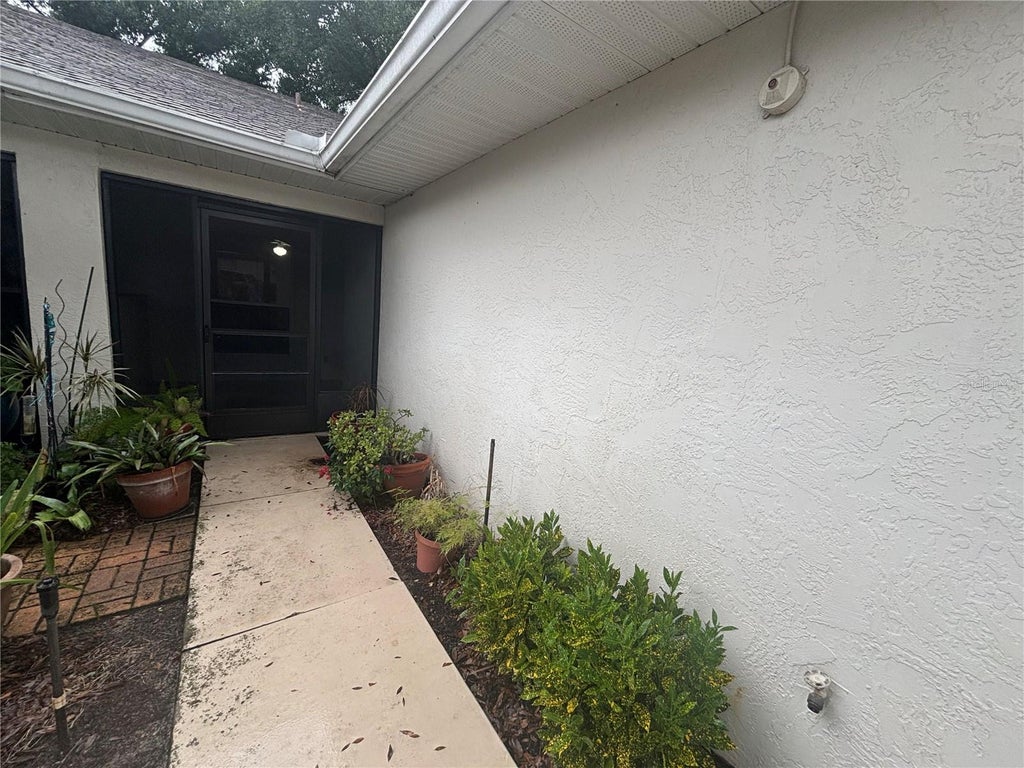 Photo of 8815 Village Green Boulevard, Clermont, FL 34711 (MLS # O6448846)