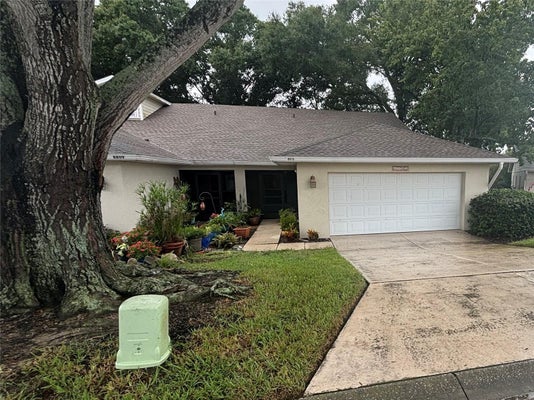 8815 VILLAGE GREEN BLVD, CLERMONT, FL 34711 - Image e61c99ec1a16b0cff48633ccfc461c9b/727059256