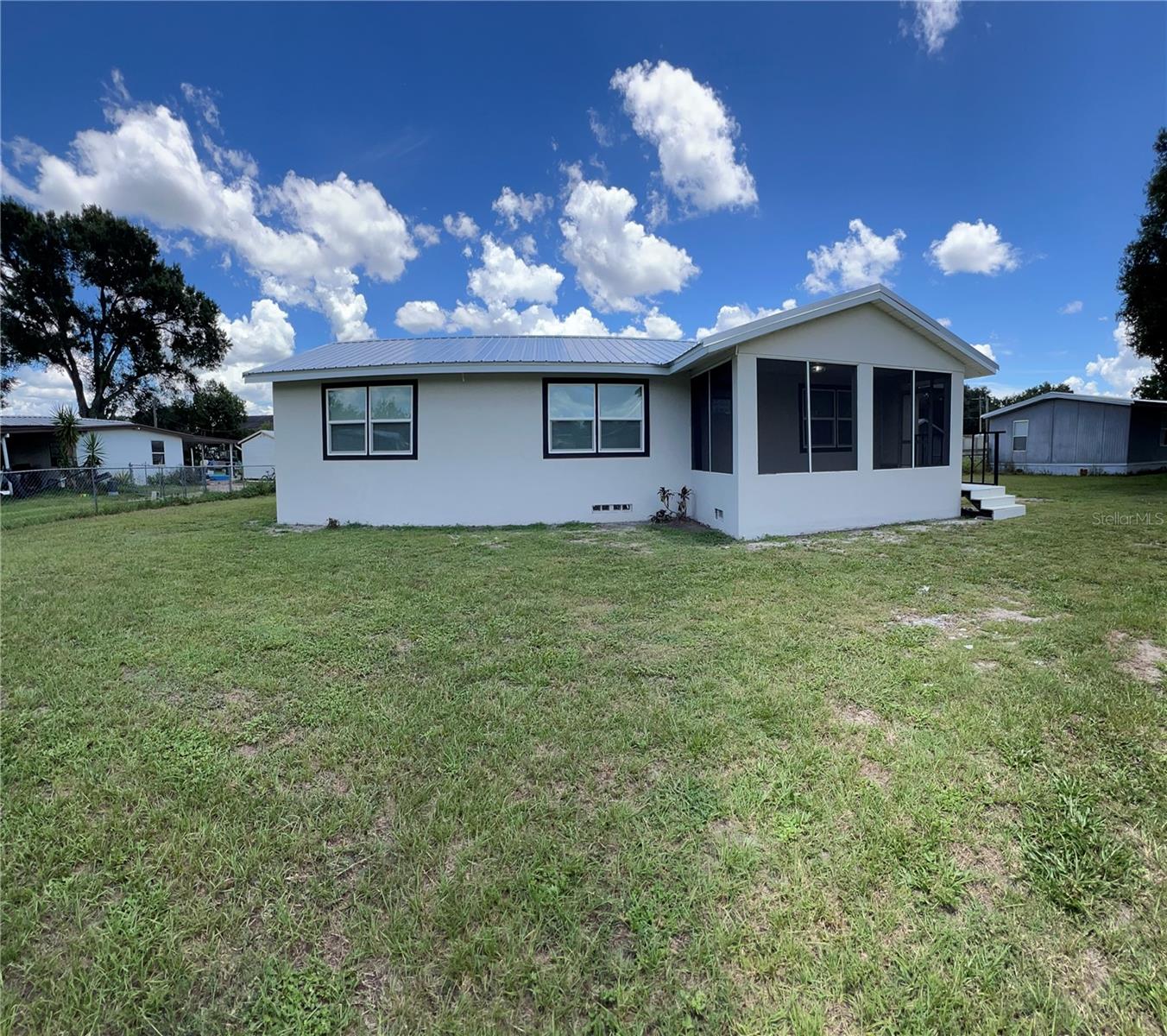 Welcome to your dream home! This freshly updated 3-bedroom, 2-bath home sits on nearly 0.5 acres with no HOA, offering the perfect blend of comfort, space, and freedom. Enjoy an open layout perfect for entertaining, a modern kitchen, and spacious bedrooms. Step outside to your huge backyard—ideal for family gatherings, gardening, or even adding a pool! Access to Clearwater Lake nearby gives you the perfect spot for fishing, boating, or relaxing weekends. Located just minutes from I-4, you'll have easy access to shopping, dining, and commuting.Brand new roof, New windows,New flooring,Fresh interior and exterior updates, AC system only 5 years old. This home is great for first time homebuyers or anyone looking to size down.