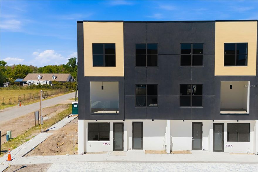 Corner Unit – Model Valeria | Live/Work Townhome in Fontanarosa Village- By DANVA CONSTRUCTION

Welcome to Unit #4355, a premier corner residence within Fontanarosa Village, offering enhanced privacy, abundant natural light, and exceptional visibility—ideal for both residential living and professional use.

This Model Valeria live/work townhouse features approximately 2,700 Sq Ft across three thoughtfully designed levels, with 3 bedrooms, 3.5 bathrooms, and 2 parking spaces, seamlessly blending modern design with everyday functionality.

What makes this Unit truly unique is its corner positioning and integrated commercial space, designed for those who want to live and work in one efficient, stylish environment.

The ground floor offers a fully dedicated commercial flex space, complete with a private entrance, office area, bathroom, kitchen, and living/studio setup—perfect for client-facing businesses or a private professional workspace.

The residential levels showcase high-quality finishes and thoughtful details throughout, including:
• Fully equipped kitchen featuring stainless steel appliances, wood cabinetry with soft-close systems, and elegant quartz countertops
• Elegant quartz countertops and wood cabinetry with soft-close system in all the bathrooms.
• In-unit washer and dryer for added convenience
• Bright open-concept living area with a private balcony off the second floor, filling the space with natural light
• Spacious primary suite featuring a walk-in closet

Ideal for:
• Entrepreneurs, creatives, and freelancers
• Attorneys, consultants, tax professionals
• Boutique or service-based businesses (per zoning)
• Remote professionals seeking a clear separation between work and home

Key highlights of Unit #1:
• Prime corner unit with enhanced exposure and light
• True live/work design with independent commercial access
• Fully approved mixed-use zoning
• Cost-efficient dual-purpose ownership
• Defined separation between business and private living spaces

Residents enjoy quality construction and community design, including impact windows and doors, energy-efficient materials, paver driveways, landscaped grounds with irrigation, and private fencing for comfort and privacy 

feature sheet- Fontanarosa

Prime Tampa Location – Convenience Meets Lifestyle

Situated in a highly accessible Tampa location, Fontanarosa Village places you within minutes of everything:

• Downtown Tampa – approx. 20–25 minutes
• Tampa International Airport (TPA) – 25–30 minutes
• Clearwater Beach & St. Pete Beach – 35–50 minutes
• Downtown St. Petersburg – 30–40 minutes

Enjoy close proximity to major retail and dining hubs, including:
• Dale Mabry retail corridor (5–10 minutes)
• International Plaza & Bay Street (15 minutes)
• Westshore Business District (15 minutes)

Nearby attractions and recreation include:
• Raymond James Stadium – 15 minutes
• ZooTampa at Lowry Park – 12 minutes
• Tampa Riverwalk – 20–25 minutes

4355 Townhouse is more than a home—it’s a flexible lifestyle investment, combining location, functionality, and long-term value in one of Tampa’s most promising growth areas.