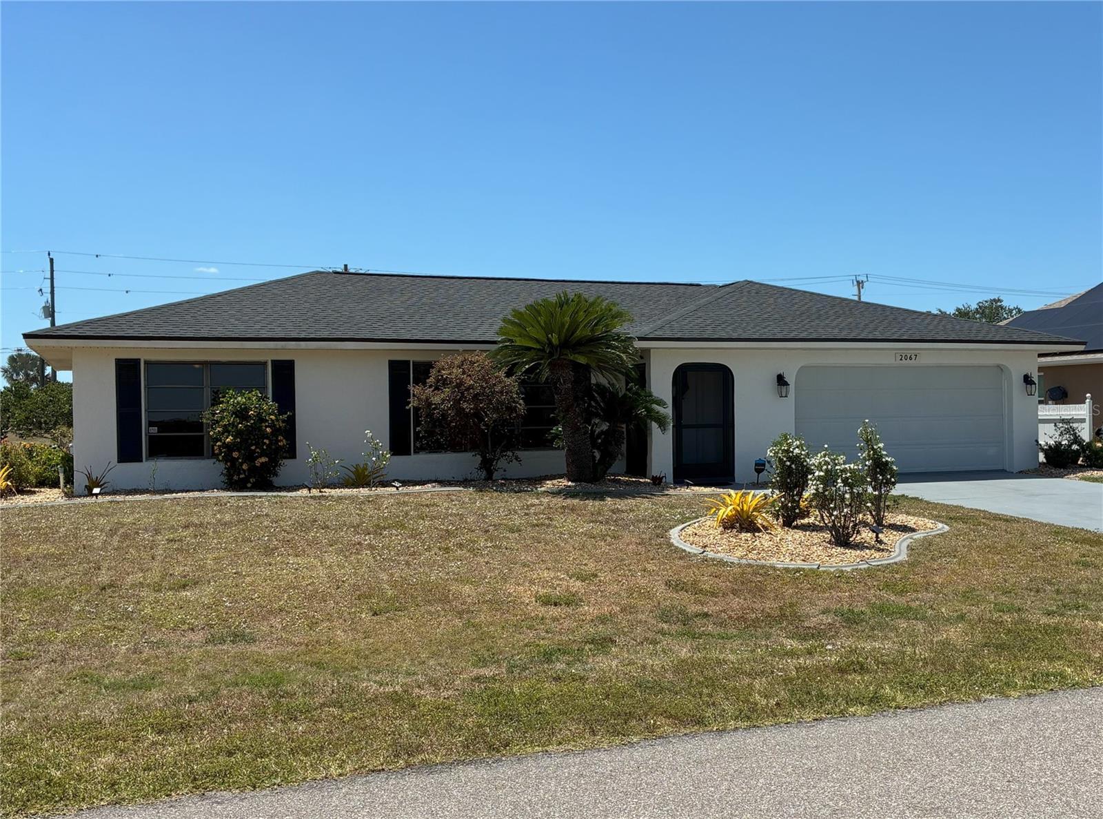 Located in the desirable Deep Creek community, this well-kept home offers a smart split floor plan with 2 generous bedrooms and 2 full baths. The open layout features tile flooring throughout, making upkeep a breeze. New IMPACT windows and doors add extra safety, peace of mind as well as comfort. The master suite includes a walk-in closet and sliding glass doors that open to a spacious lanai—ideal for quiet mornings or entertaining friends. A roomy 2-car garage gives you plenty of storage. Tucked away in a peaceful neighborhood, this move-in ready home is waiting for you.
