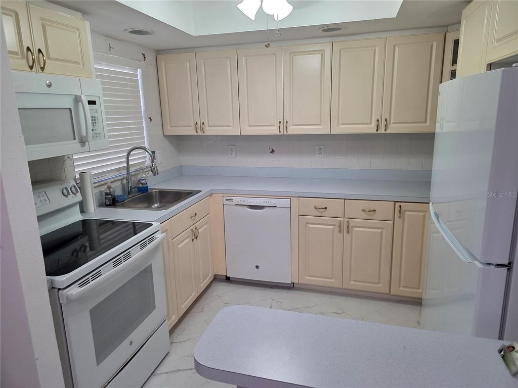 Photo of 7981 Smoketree Court, Largo, FL 33773 (MLS # TB8460303)