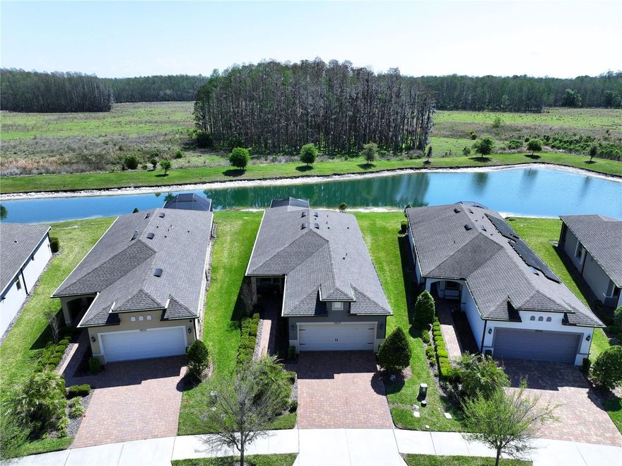 TOTAL ELEGANCE with 2 Bedrooms | 2 Bathrooms | 2-Car Garage, plus EXTENDED Patio overlooking AMAZING Conservation & Water views, located in the highly sought-after Del Webb BEXLEY community.  This well-designed Steel Creek model by Pulte Homes showcases an OPEN-CONCEPT floor plan that seamlessly connects the MAIN living spaces—perfect for everyday LIVING!  At the HEART of the HOME, the gourmet Kitchen impresses with a LARGE center island featuring breakfast bar seating, stone countertops, wood cabinetry with crown molding, soft-close drawers with pull-outs, stainless steel appliances, a GAS range, tile backsplash, and a pantry with a built-in spice rack.  An additional Eat-In space offers flexibility as a cozy dining nook or stylish coffee/wine bar.  A separate DINING area provides the perfect space for ENTERTAINING during holidays and those special occasions.  The spacious Living Room is highlighted by triple sliding glass doors bringing in an ABUNDANCE of natural light, creating a warm and inviting ATMOSPHERE.  STEP outside to your private EXTENDED (23 x 15) Covered & Screened Patio, complete with PANORAMIC screen panels and epoxy flooring – providing additional OUTDOOR entertaining space – perfect for enjoying your morning coffee or relaxing while taking in the peaceful conservation and water views, often accompanied by local WILDLIFE.  The Owner’s Suite has a Walk-In Closet, and a private En Suite Bath features vanity with dual sinks, stone countertops, and a glass-enclosed walk-in shower with designer tile.  A secondary bedroom and full bath offer comfortable accommodations for guests.  The UPGRADED secondary bathroom features stone vanity and tub/shower combo with designer tile.  Additional highlights include a Laundry Room with front-load Washer & Dryer, a two car Garage with epoxy flooring, utility sink, and NEW water softener system.
ENTER from the garage to a convenient DROP ZONE, complete with a coat closet for additional storage and everyday organization.
Other UPGRADES include Accordion Hurricane Shutters, Crown Molding, Custom Front Door, Plantation Shutters, and Remote-Controlled Sunshade.  Del Webb Bexley is a premier GATED 55+ active adult LIFESTYLE community, residents enjoy access to the impressive Meridian Clubhouse (19,000 sq ft) featuring a state-of-the-art Fitness Center, Movement Studio, Craft Room, Grand Ballroom, Multipurpose Rooms, and on-site Bistro. Outdoor amenities include a RESORT-style heated pool, resistance pool, and spa, all surrounded by a spacious patio with grilling stations and a firepit.  Additional community features include Bocce Ball, Pickleball, Tennis Courts, a Community Garden, and a Dog Park with separate areas for large and small pets. Residents can also enjoy an outdoor Amphitheatre with event lawn and miles of scenic sidewalks and roads perfect for biking, jogging, or walking alongside natural preserves and tranquil ponds. GOLF CART friendly!  Conveniently located with EASY access onto SR 54, the Suncoast Expressway, I-75, I-275, downtown Tampa and Tampa International Airport.  LOCATION, LOCATION, LOCATION.  Nearby beaches, golf courses, medical facilities, shopping, restaurants, and much more!  This exceptional HOME offers the perfect blend of ELEGANCE, LIFESTYLE, & LOCATION.  Schedule your PRIVATE showing TODAY!