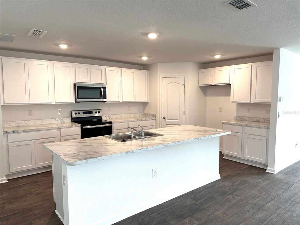 Photo of 28 Hulett Woods Road, Palm Coast, FL 32137 (MLS # FC296537)